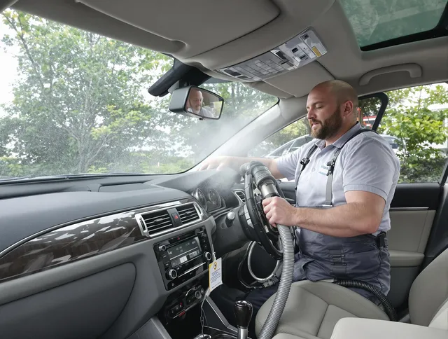 Millbury Air Duct Cleaning specialist performing professional car duct cleaning in Millbury